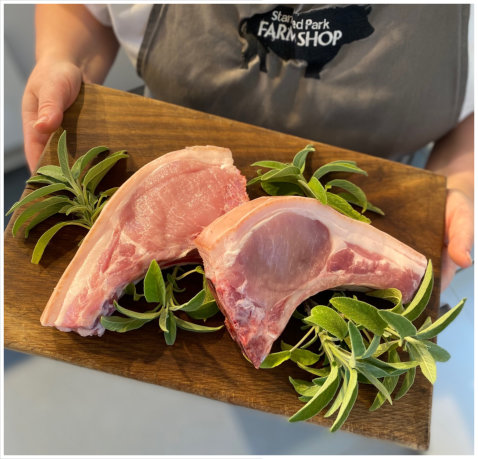 Pork chops with apple and mushroom sauce